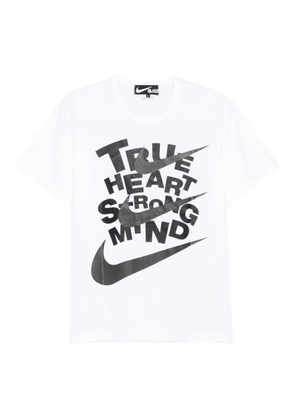Black Comme Des Garçons slogan-print T-shirt - White
