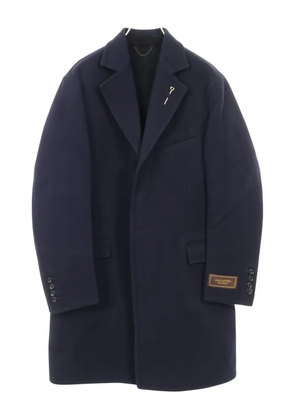 Louis Vuitton Pre-Owned 2010s Staples Editon monogram coat - Blue