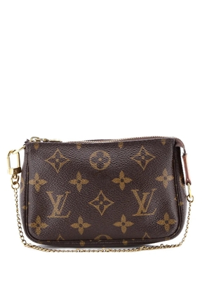 Louis Vuitton Pre-Owned Pochette Accessoires Monogram Canvas Mini clutch bag - Brown