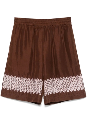 Feng Chen Wang graphic-print shorts - Brown