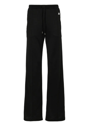 Courrèges logo-patch jersey track pants - Black