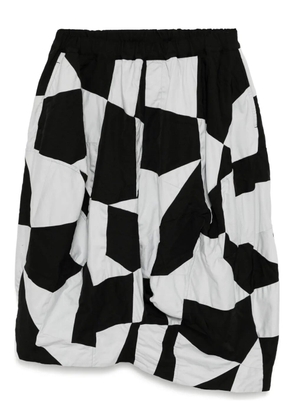 Black Comme Des Garçons patchwork trousers