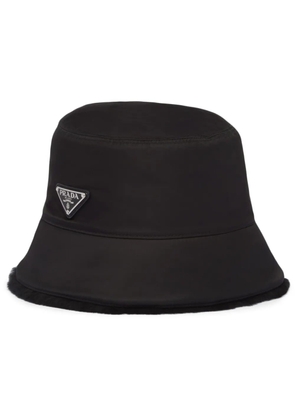Prada triangle-logo shearling bucket hat - Black