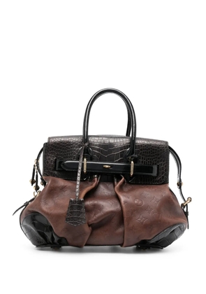 Louis Vuitton Pre-Owned Monogram Debossed box-pleat detail panelled handbag - Brown