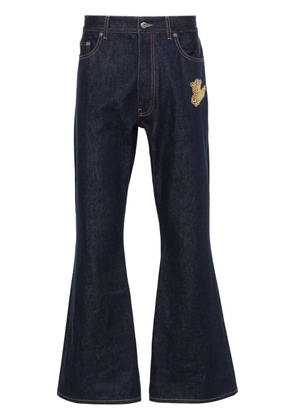 Off-White logo-embroidered flared jeans - Blue