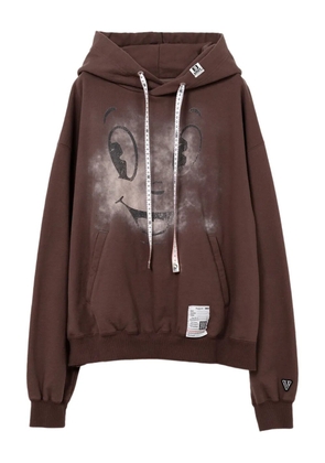 Maison MIHARA YASUHIRO Happy Face-print hoodie - Brown
