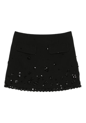 Maje sequin-embellished flap-pocket skirt - Black
