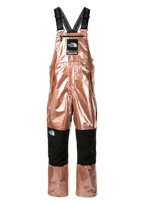 Supreme TNF metallic bib pant - Gold
