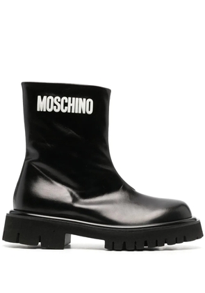 Moschino embossed-logo zipped leather boots - Black