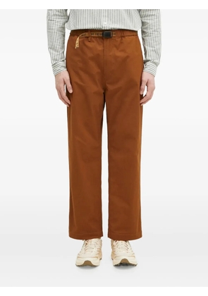 Human Made slide-buckled trousers - Brown