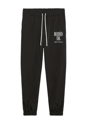 1989 STUDIO logo-print track pants - Black
