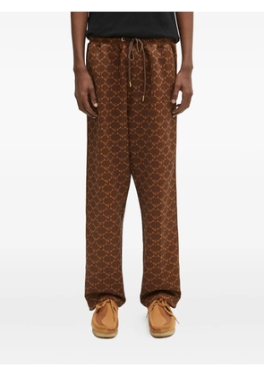 A BATHING APE® logo-print side-stripe trousers - Brown