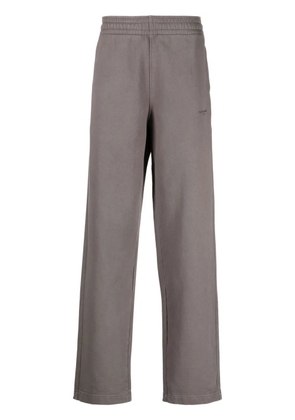 Holzweiler logo-print track pants - Grey