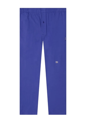 Advisory Board Crystals elasticated-waist logo-patch trousers - Blue