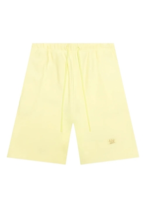 Advisory Board Crystals logo-patch drawstring shorts - Yellow