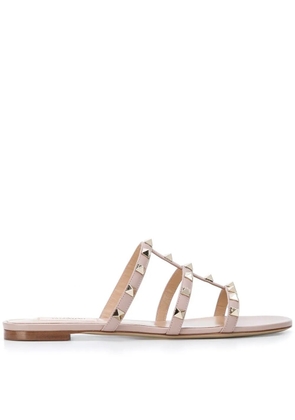 Valentino Garavani Rockstud flat leather sandals - Neutrals