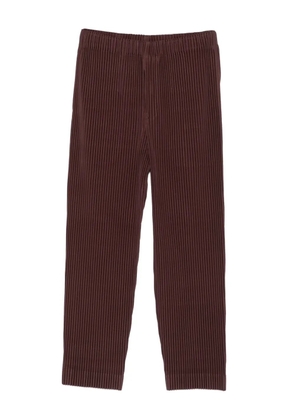 Homme Plissé Issey Miyake pleated cropped trousers - Brown