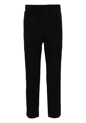 Homme Plissé Issey Miyake Basic tapered plissé trousers - Black