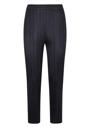 Pleats Please Issey Miyake plissé-effect trousers - Black
