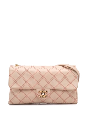 CHANEL Pre-Owned 2014 Jumbo Quilted Calfskin Triple Stitched Flap crossbody bag - Brown