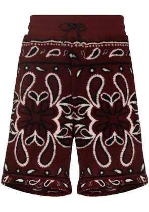 AMIRI bandana print fleece track shorts - Red