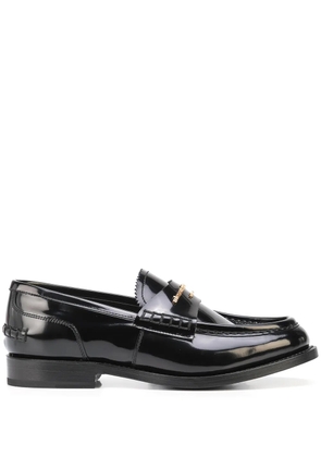 Alexander Wang embossed-logo loafers - Black