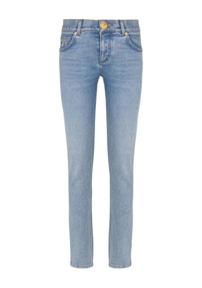 Balmain faded-wash button-embellished jeans - Blue