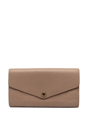 Louis Vuitton Pre-Owned 2018 Monogram Empreinte Sarah Wallet long wallets - Brown