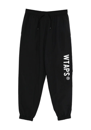 WTAPS logo-print track trousers - Black
