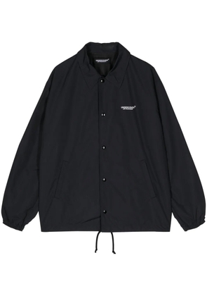 Undercover logo-print bomber jacket - Black
