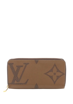 Louis Vuitton Pre-Owned 2021-2025 Monogram Giant Reverse Zippy Wallet long wallets - Brown