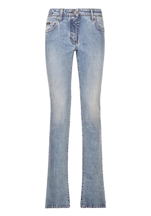 Dolce & Gabbana logo-patch low-rise bootcut jeans - Blue