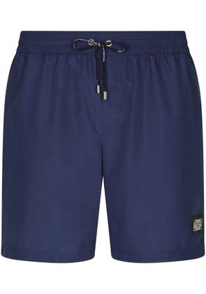 Dolce & Gabbana logo-tag swim shorts - Blue
