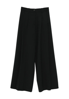 Nine In The Morning butoon-fastening pleated trousers - Black