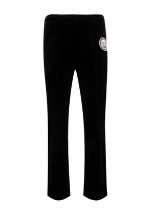 SAINT MXXXXXX logo-patch trousers - Black