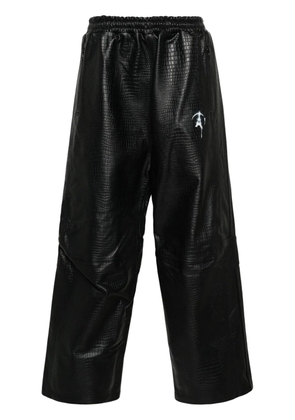 Doublet crocodile-pattern leather track pants - Black