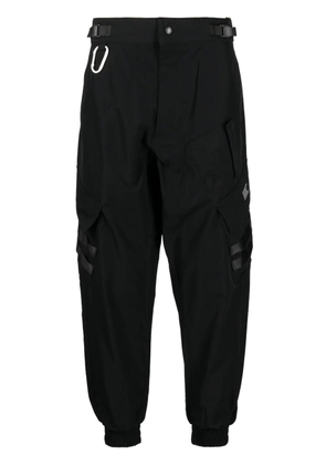 izzue cargo tapered-leg trousers - Black