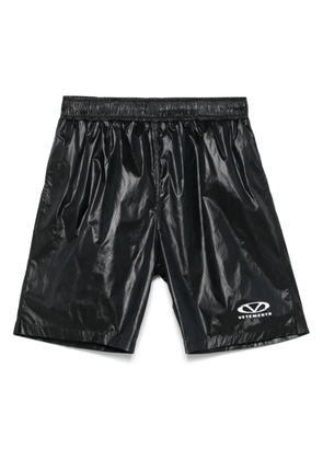 VETEMENTS oval-logo swim shorts - Black