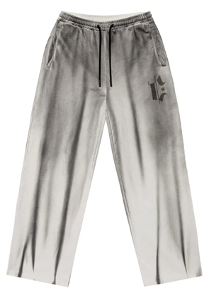 COUNTY OF MILAN spray-effect track pants - Neutrals