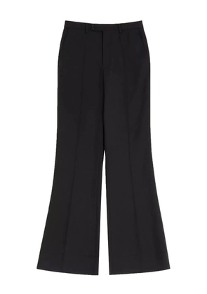 Valentino Garavani pleated flared trousers - Black