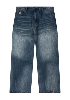 KidSuper washed-effect dove-detail jeans - Blue