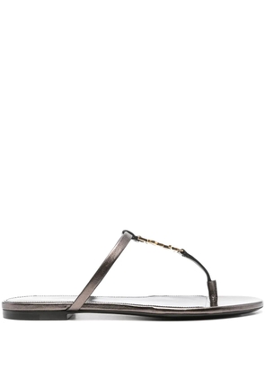 Saint Laurent Cassandra leather flip flops - Brown