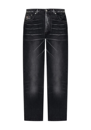 Moschino logo-plaque faded-wash jeans - Black