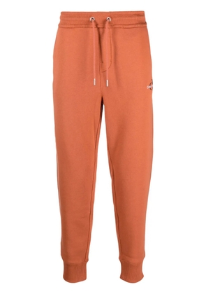 Calvin Klein Jeans logo-embroidered track pants - Orange