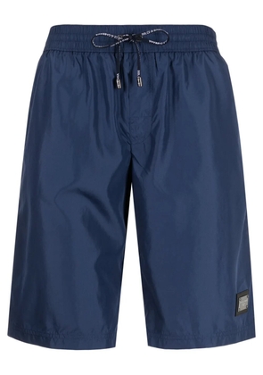 Dolce & Gabbana logo-appliqué swim shorts - Blue
