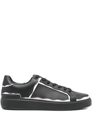 Balmain Pre-Owned monogram-embossed B-Court sneakers - Black