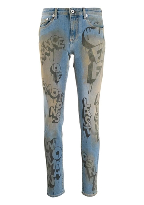 Off-White graffiti print skinny jeans - Blue