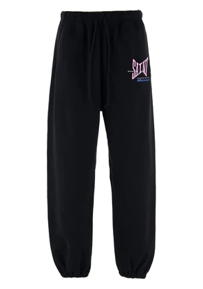 SAINT MXXXXXX logo-print track pants - Black