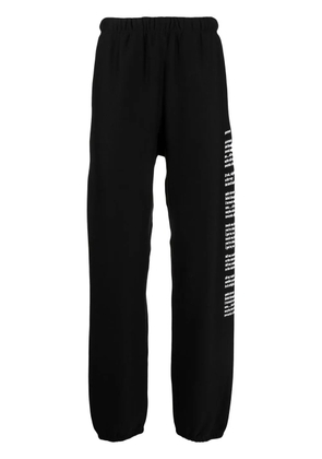 Takahiromiyashita The Soloist graphic-print track pants - Black