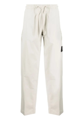 Calvin Klein Technical logo-appliqué trousers - Neutrals